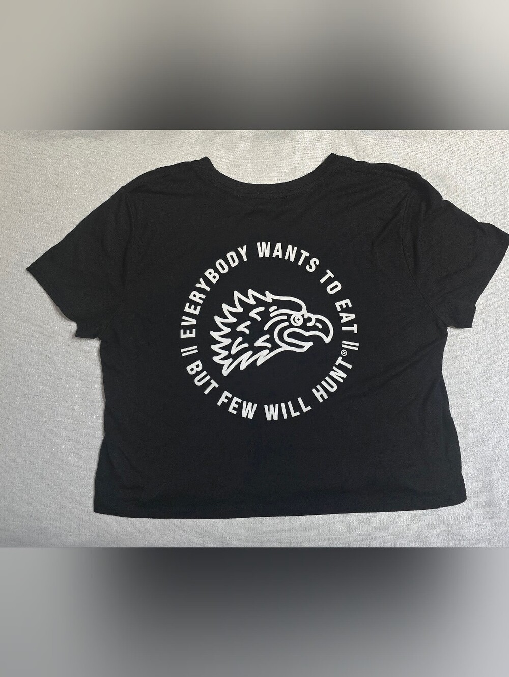 Few Will Hunt Black Graphic T‑Shirt with White Eagle Logo Everybody Wants To Eat